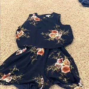 Flowered navy blue opened back romper